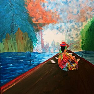 A woman in a bright colored dress holding her hat floats along on the bow of a boat.