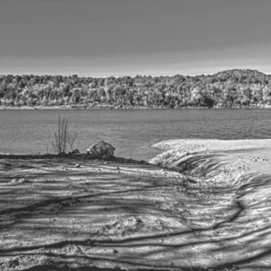 A solemn black and white landscape picture.